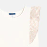 Girl's ecru top with ruffled cap sleeves
