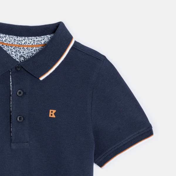 Boy's navy blue cotton piqué polo shirt with short sleeves