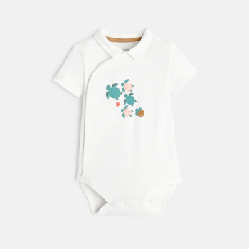 Baby boy's white turtle bodysuit and soft trousers