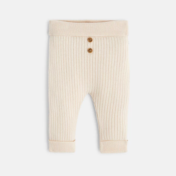 Baby boy's white turtle bodysuit and soft trousers