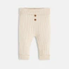 Baby boy's white turtle bodysuit and soft trousers