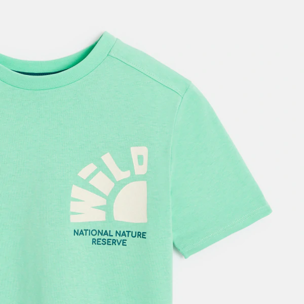 Boy's green T-shirt with a slogan motif on the back and front