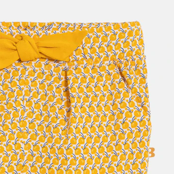 Baby girl's yellow graphic print trousers with elasticated waist
