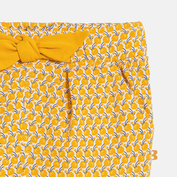 Baby girl's yellow graphic print trousers with elasticated waist