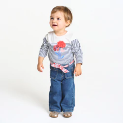 Baby girl's blue denim wide-legged jeans with floral belt
