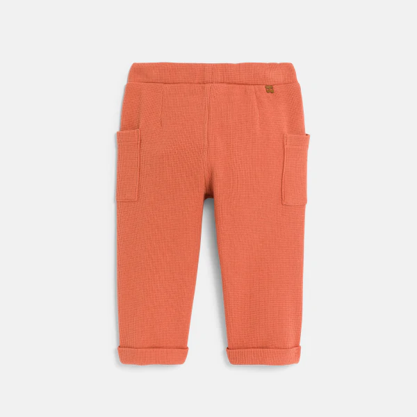 Baby boy's terracotta patterned cotton trousers