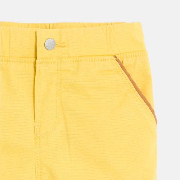 Baby boy's yellow textured cotton trousers