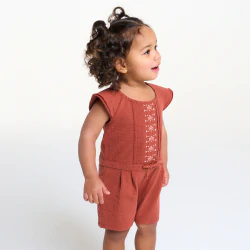 Baby girl's red textured playsuit