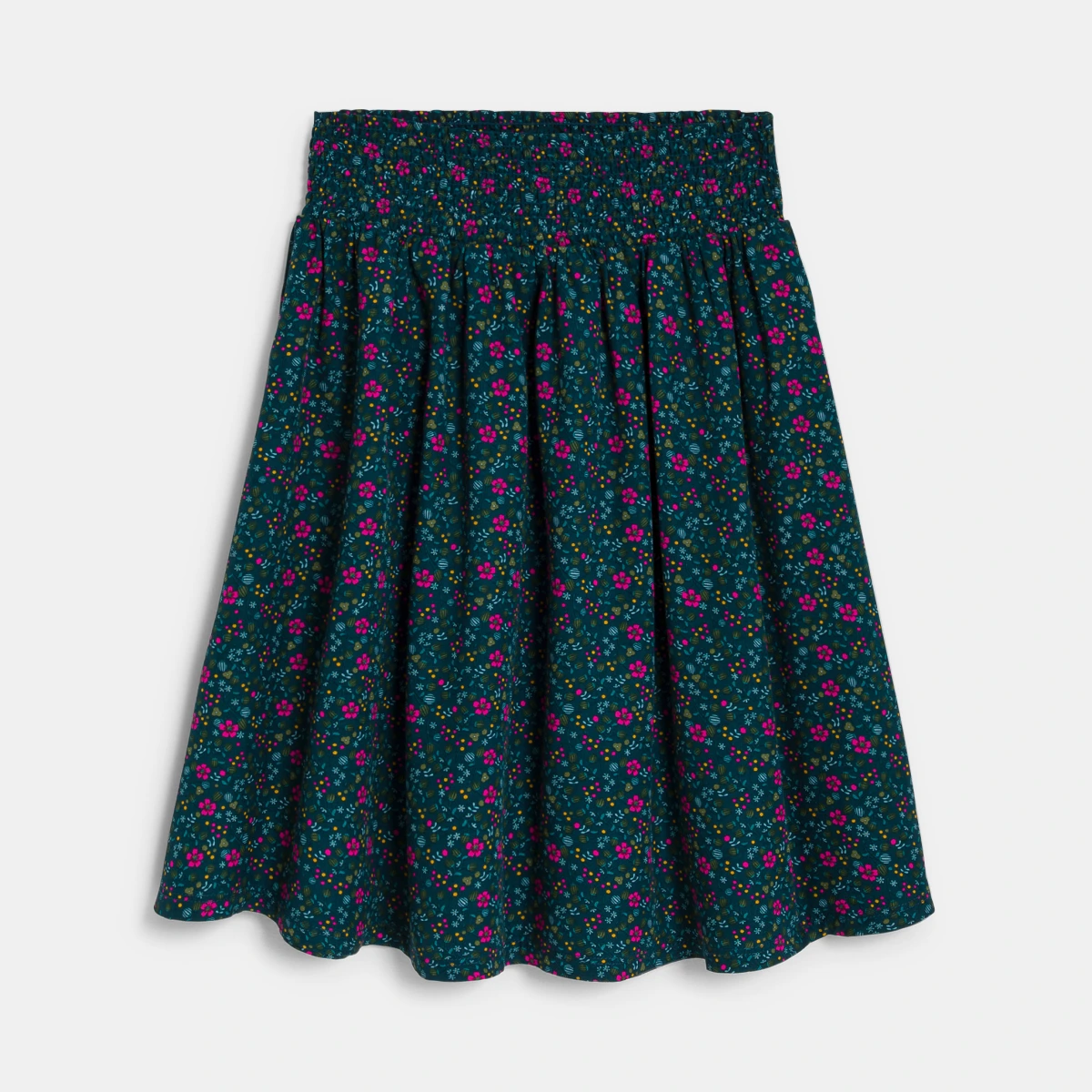 تنورة للفتيات بطول متوسط، باللون الأخضر ونقشة مطبوعة. تنورة للفتيات بطول متوسط، باللون الأخضر ونقشة مطبوعة.