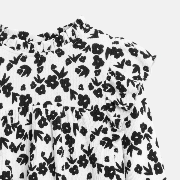 Girl's black printed ruffle blouse