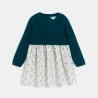 فستان منسوج من مادتين، من الجيرسي والنسج بالدرز باللون الأخضر للفتيات الرضع. فستان منسوج من مادتين، من الجيرسي والنسج بالدرز باللون الأخضر للفتيات الرضع.