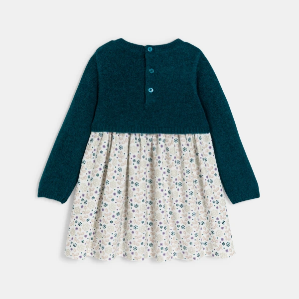 فستان منسوج من مادتين، من الجيرسي والنسج بالدرز باللون الأخضر للفتيات الرضع. فستان منسوج من مادتين، من الجيرسي والنسج بالدرز باللون الأخضر للفتيات الرضع.