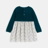 فستان منسوج من مادتين، من الجيرسي والنسج بالدرز باللون الأخضر للفتيات الرضع. فستان منسوج من مادتين، من الجيرسي والنسج بالدرز باللون الأخضر للفتيات الرضع.