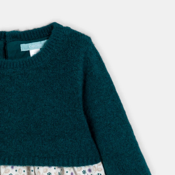 فستان منسوج من مادتين، من الجيرسي والنسج بالدرز باللون الأخضر للفتيات الرضع. فستان منسوج من مادتين، من الجيرسي والنسج بالدرز باللون الأخضر للفتيات الرضع.