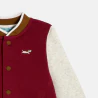 Baby boy's two-tone baseball jacket with red dog print