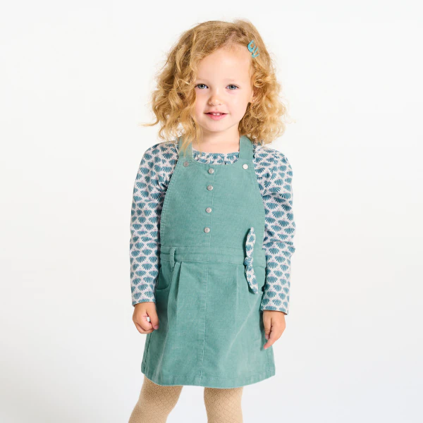 Baby girl's blue velvet dungaree dress and T-shirt