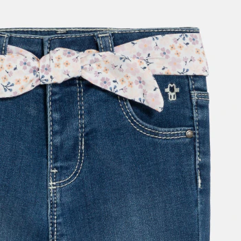 Baby girl's blue jeans with floral belt