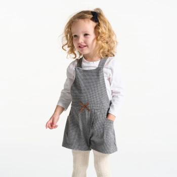 Baby girl's warm patterned overall-shorts and grey T-shirt