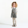 Baby girl's warm patterned overall-shorts and grey T-shirt
